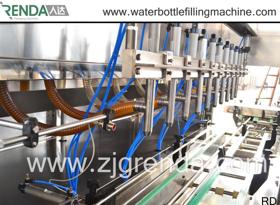 Disuasión automática del lavadero de las máquinas de rellenar del aceite que llena la máquina líquida comercial del llenador de la capacidad de 1L 2L 5L